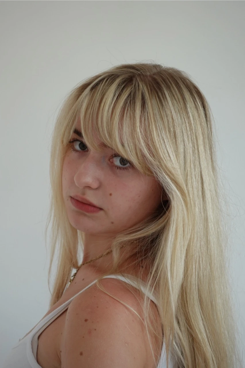 Adéla L.